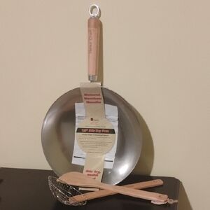 Helen's Asian Kitchen Carbon Steel Wok with a natural bamboo handle